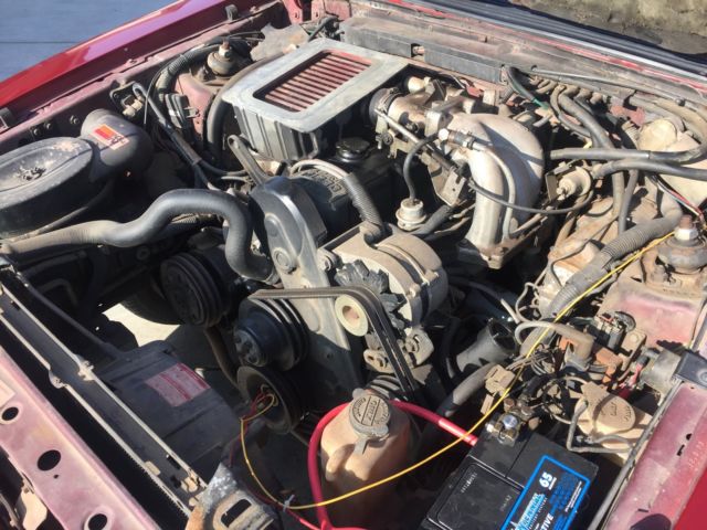 1984 Red Ford Mustang Hatchback