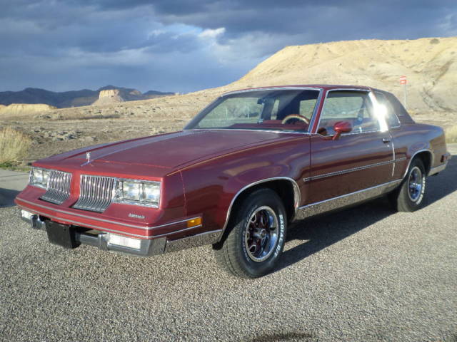 1984 Maroon Metallic Oldsmobile Cutlass Coupe
