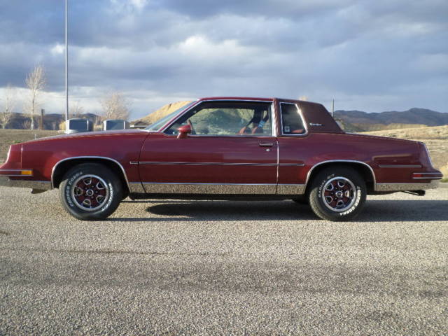 1984 Maroon Metallic Oldsmobile Cutlass Coupe