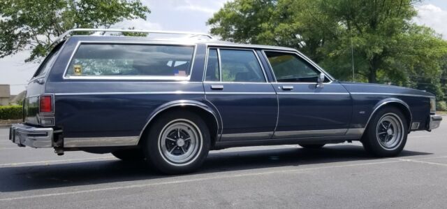 1984 Blue Oldsmobile Custom Cruiser Wagon