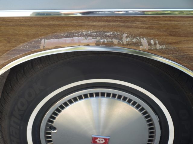 1984 Gray Oldsmobile Custom Cruiser Station Wagon