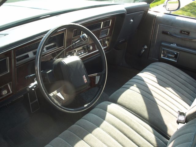 1984 Gray Oldsmobile Custom Cruiser Station Wagon