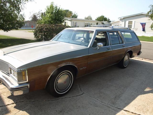 1984 Gray Oldsmobile Custom Cruiser Station Wagon