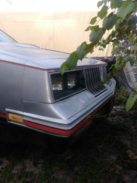 1984 Silver Oldsmobile Cutlass Convertible