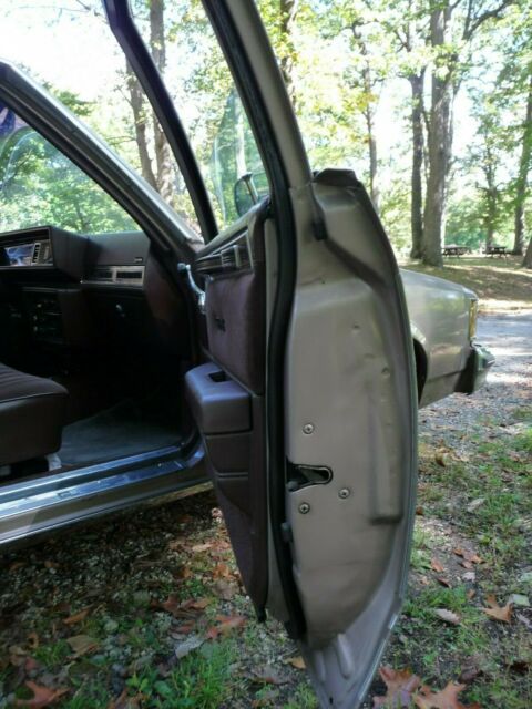 1984 Beige Oldsmobile Cutlass Sedan