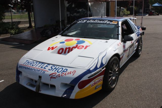1984 white blue Pontiac Fiero Coupe
