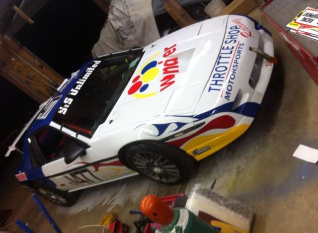 1984 white blue Pontiac Fiero Coupe