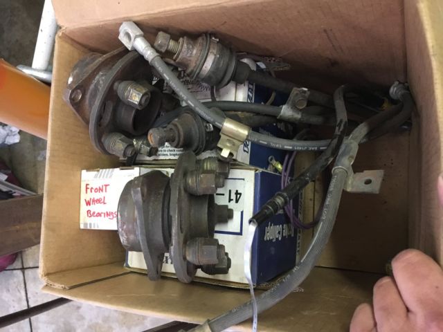 1984 white blue Pontiac Fiero Coupe