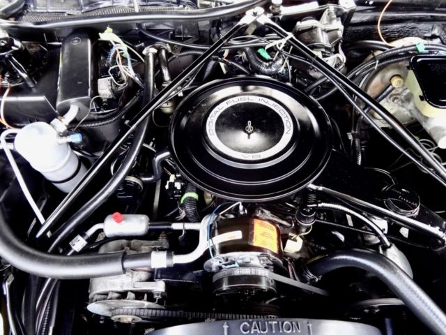 1984 White Cadillac DeVille Sedan