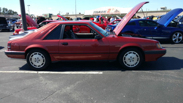 1985 Medium Canyon Red Ford Mustang Hatchback