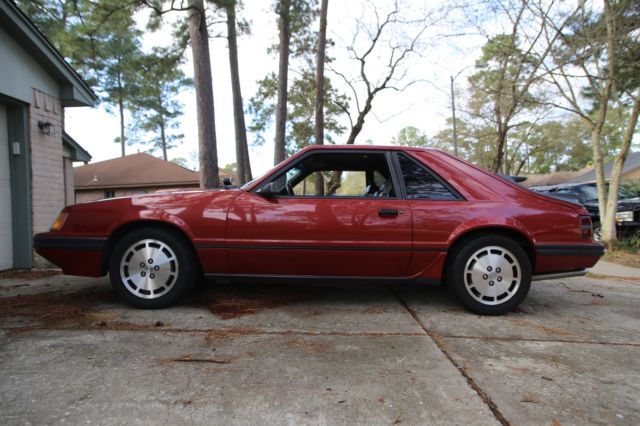 1985 Red Ford Mustang Hatchback