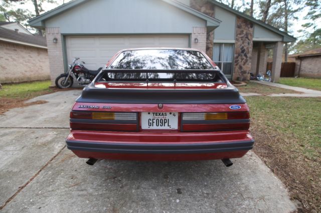 1985 Red Ford Mustang Hatchback