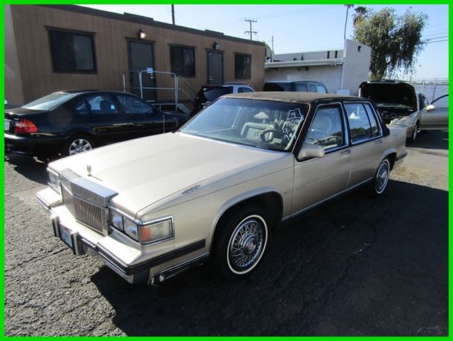 1985 Gold Cadillac Fleetwood
