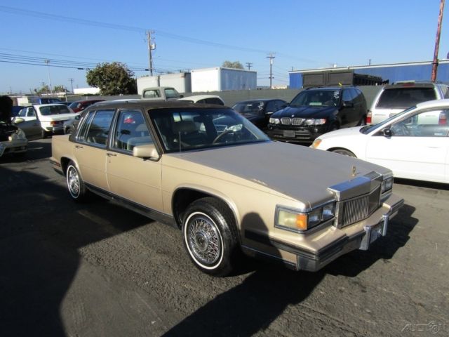1985 Gold Cadillac Fleetwood