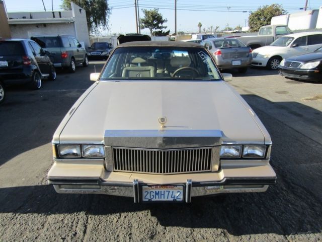 1985 Gold Cadillac Fleetwood
