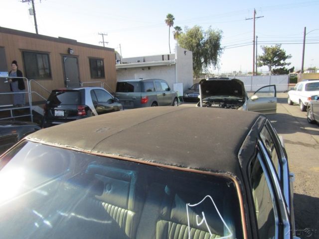 1985 Gold Cadillac Fleetwood