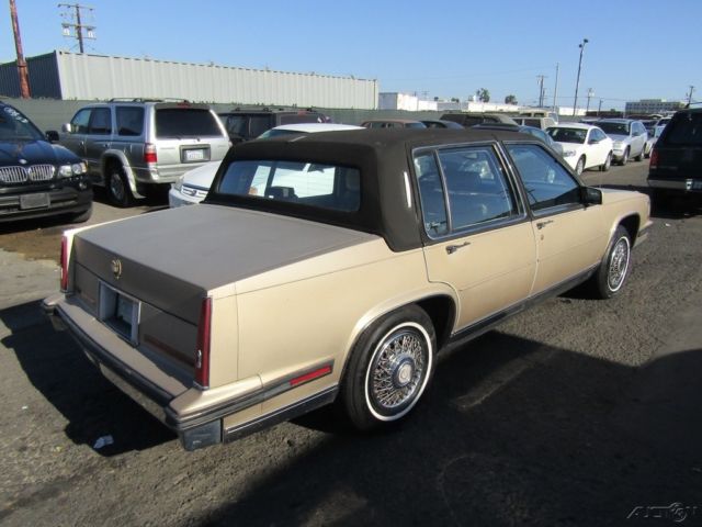 1985 Gold Cadillac Fleetwood