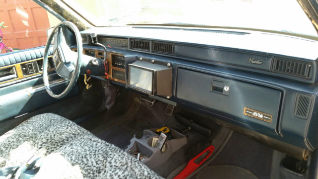 1985 Blue Cadillac Fleetwood Sedan
