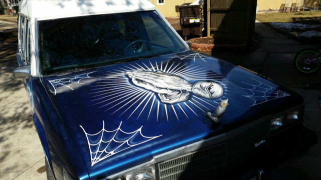 1985 Blue Cadillac Fleetwood Sedan