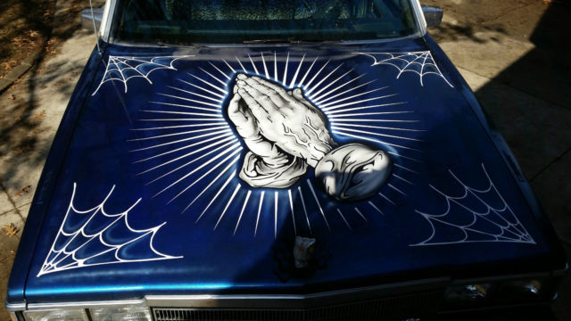 1985 Blue Cadillac Fleetwood Sedan