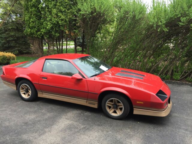 1985 Red with gold Chevrolet Camaro Coupe