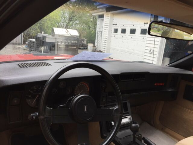 1985 Red with gold Chevrolet Camaro Coupe