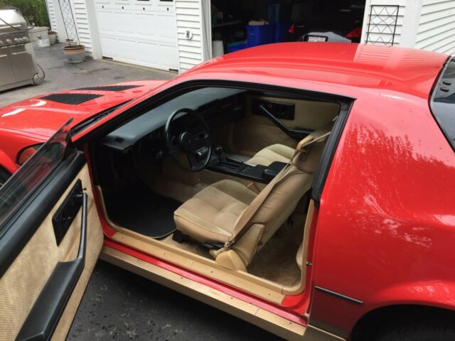 1985 Red with gold Chevrolet Camaro Coupe