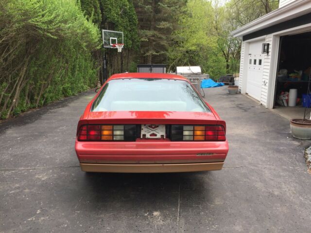 1985 Red with gold Chevrolet Camaro Coupe