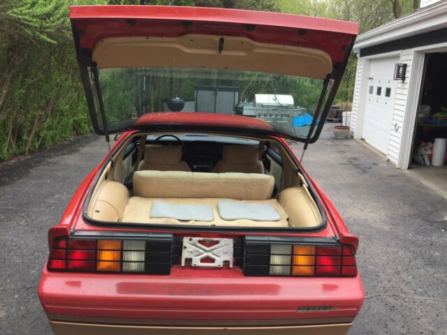 1985 Red with gold Chevrolet Camaro Coupe