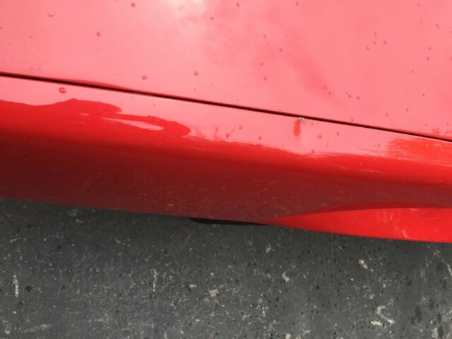 1985 Red with gold Chevrolet Camaro Coupe