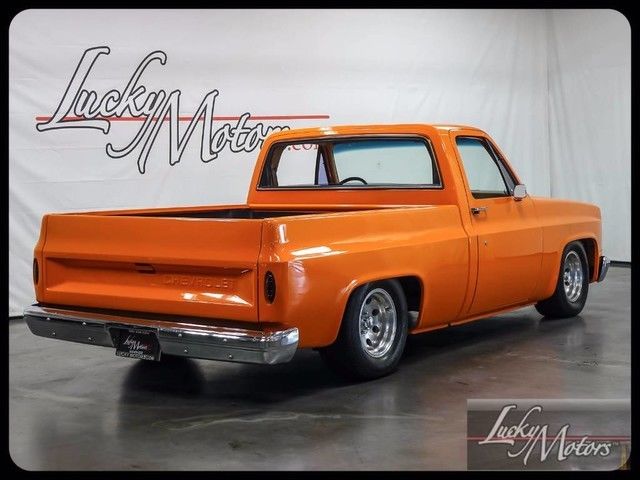 1985 Orange Chevrolet C-10 Pickup Truck