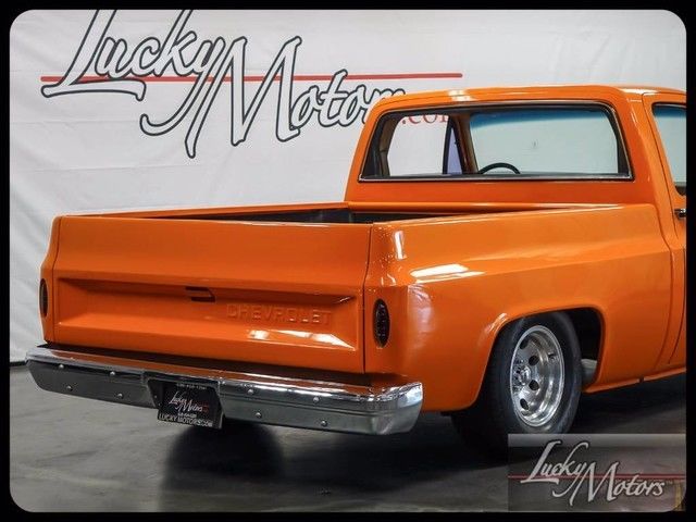 1985 Orange Chevrolet C-10 Pickup Truck