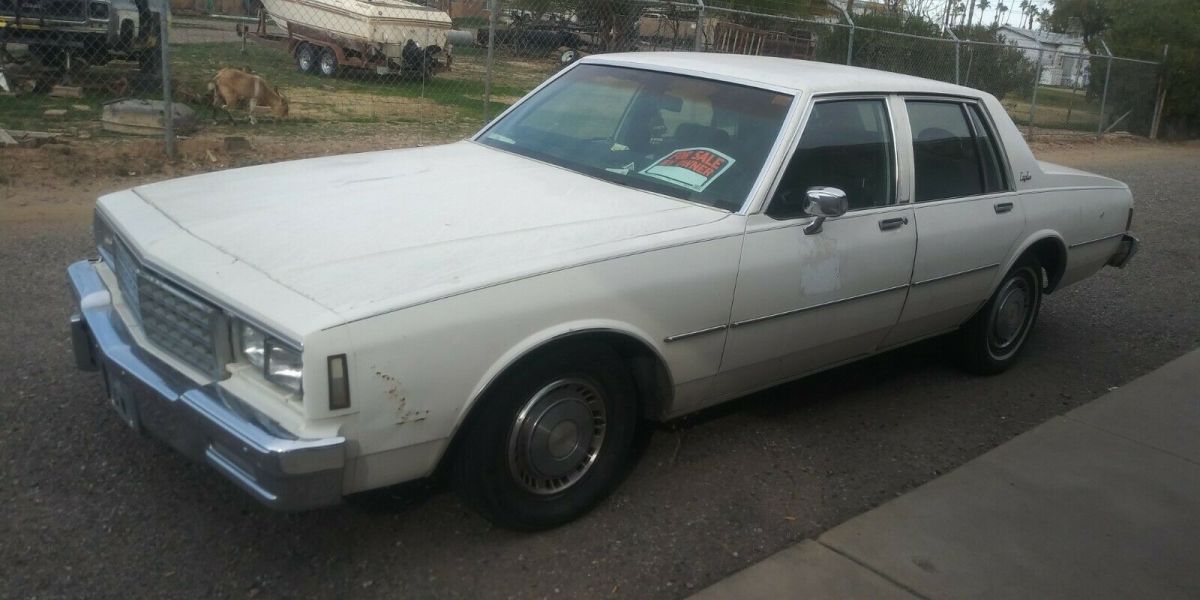 1985 White Chevrolet Impala Sedan