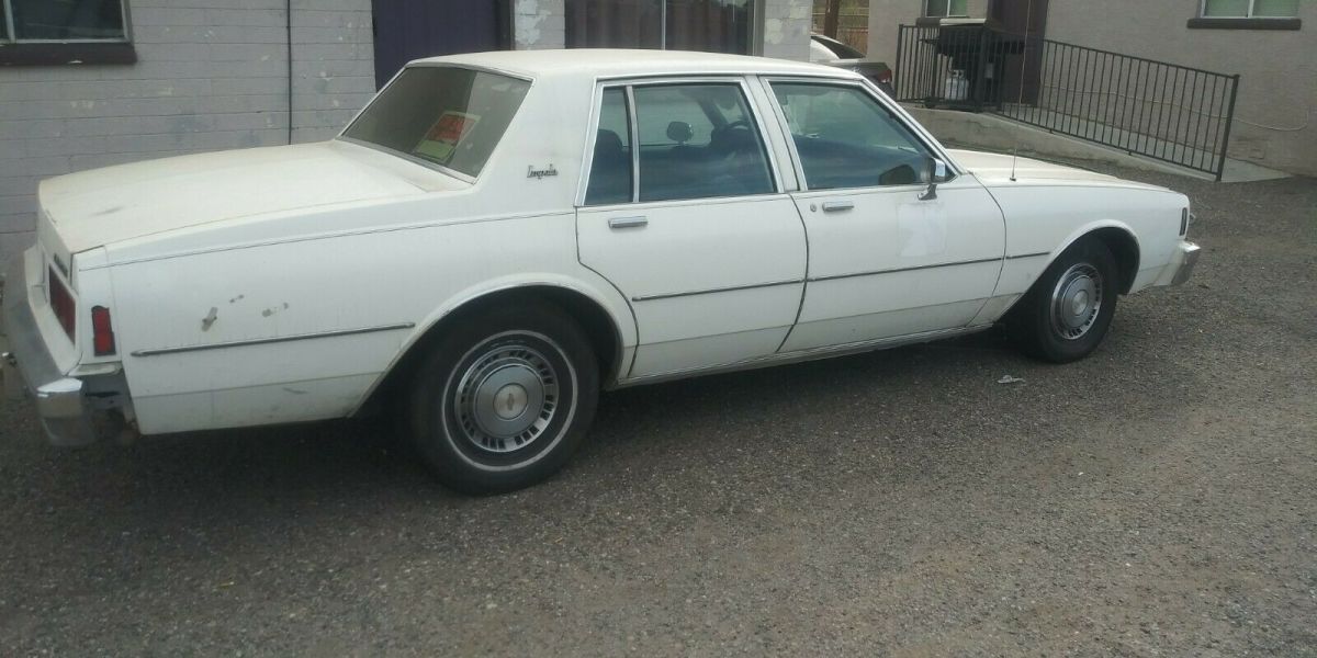 1985 White Chevrolet Impala Sedan