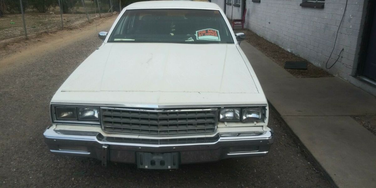 1985 White Chevrolet Impala Sedan