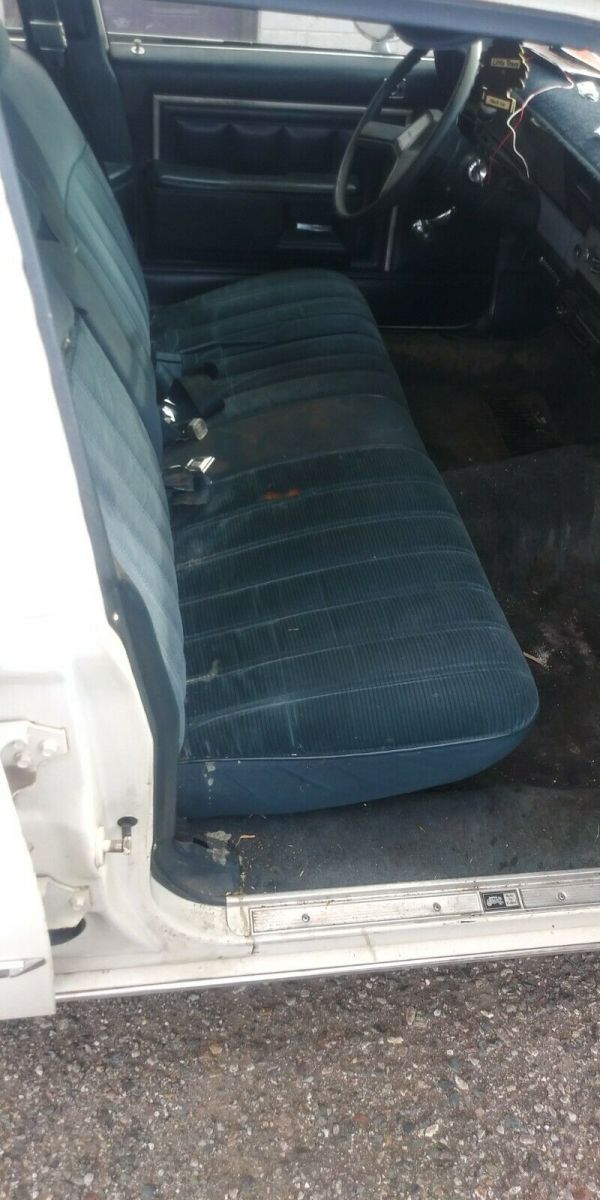 1985 White Chevrolet Impala Sedan