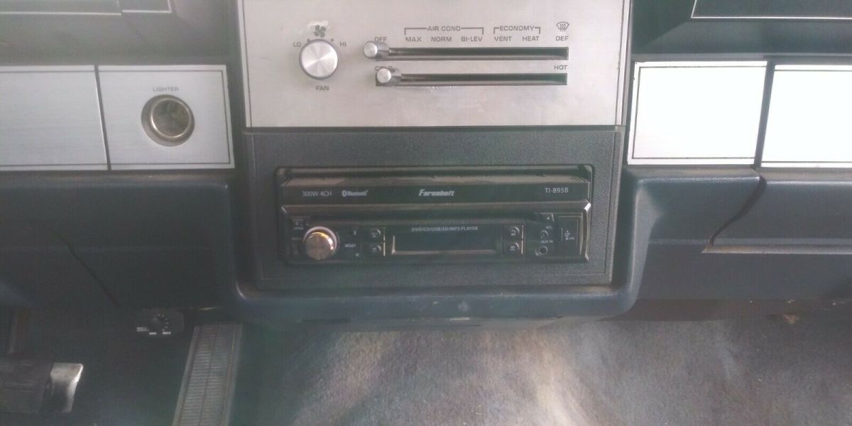 1985 White Chevrolet Impala Sedan