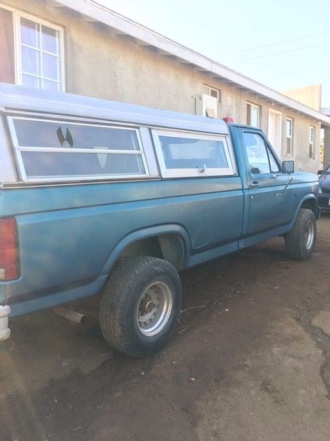 1985 Blue Ford F-150 Single cab, long bed