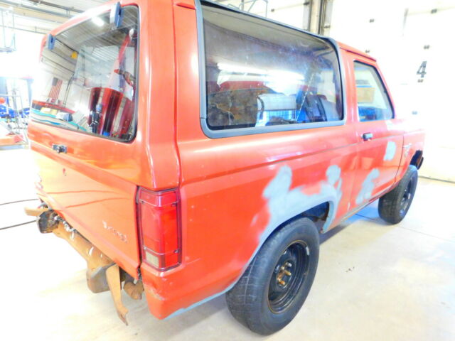 1985 Red Ford Bronco II Jeep