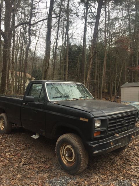 1985 Blue Ford F-250 Extended Cab Pickup
