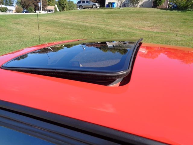 1985 Red Ford Mustang Hatchback