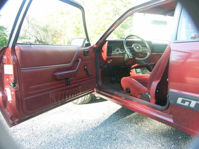 1985 Red Ford Mustang Hatchback