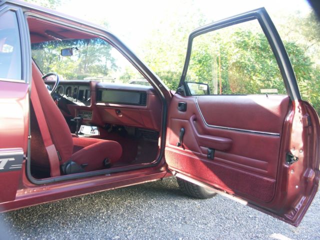 1985 Red Ford Mustang Hatchback