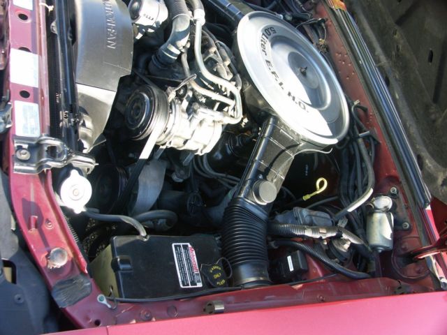 1985 Red Ford Mustang Hatchback