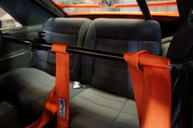 1985 Orange Ford Mustang Hatchback