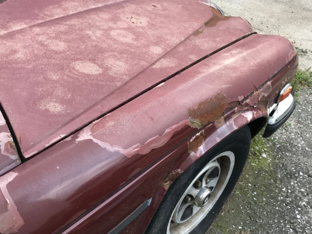 1985 Burgundy Jaguar XJ6 Sedan