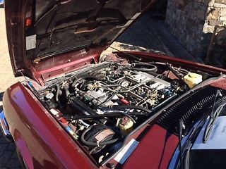 1985 Burgundy Jaguar XJS Convertible