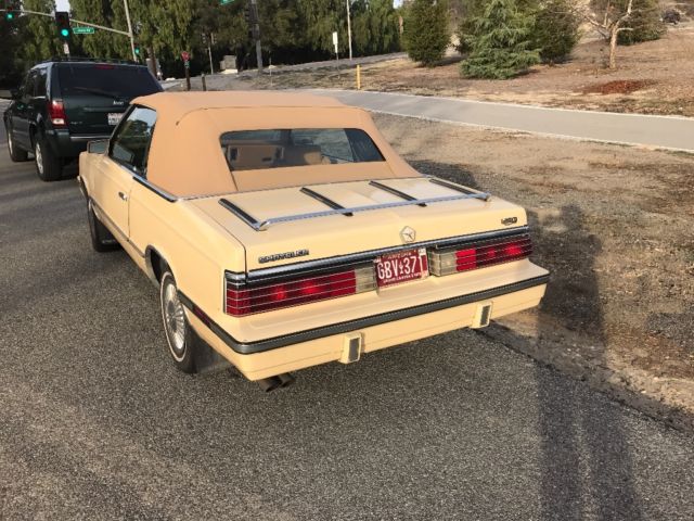 1985 Yellow Chrysler LeBaron Convertible