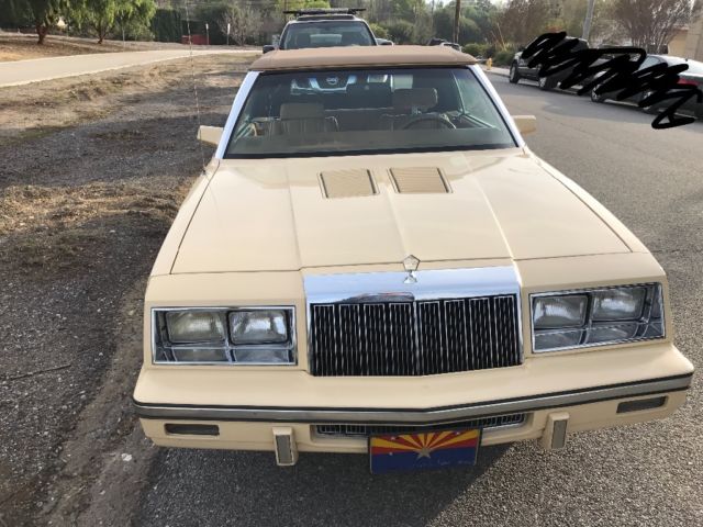 1985 Yellow Chrysler LeBaron Convertible