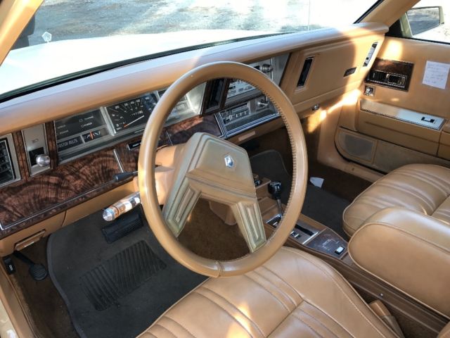 1985 Yellow Chrysler LeBaron Convertible